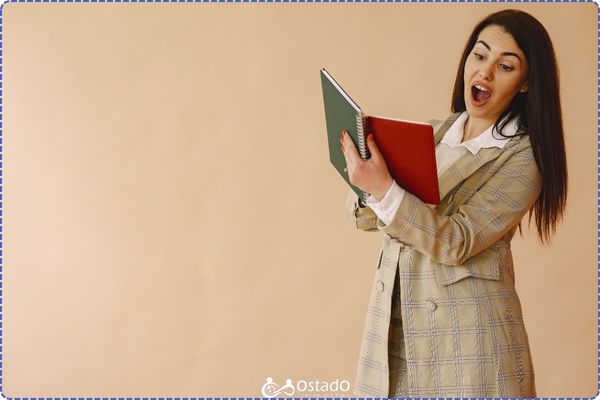 A photo of a woman reading a book out loud