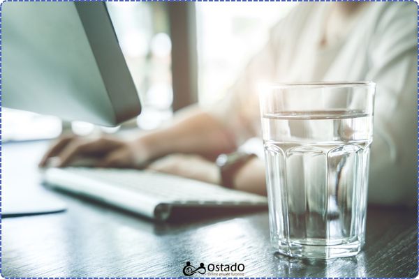 A glass of water on your desk to remind you to stay hydrated 